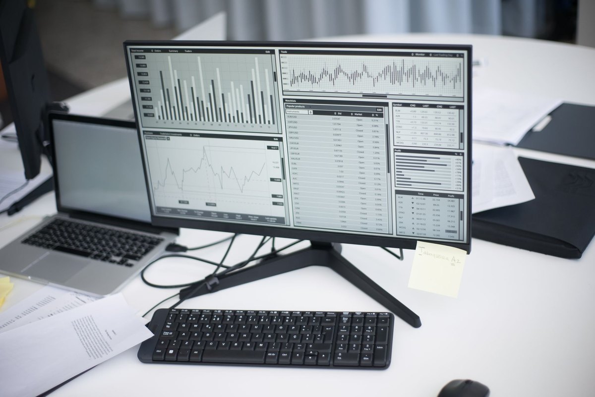 What 2,000 education company websites say about the state of eLearning marketing A professional computer monitor displaying complex data charts and analytics, representing a marketing audit.